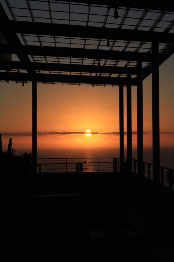 Landscape — ocean sunset framed by pergola silhouette