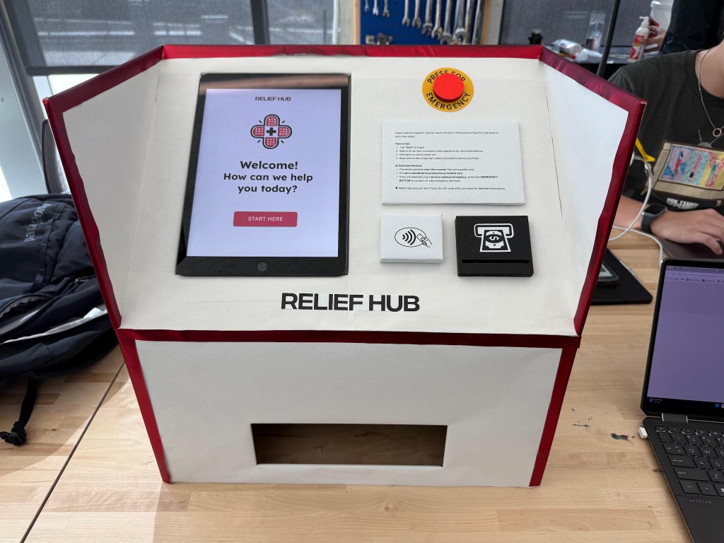 Front view of the completed ReliefHub physical kiosk prototype