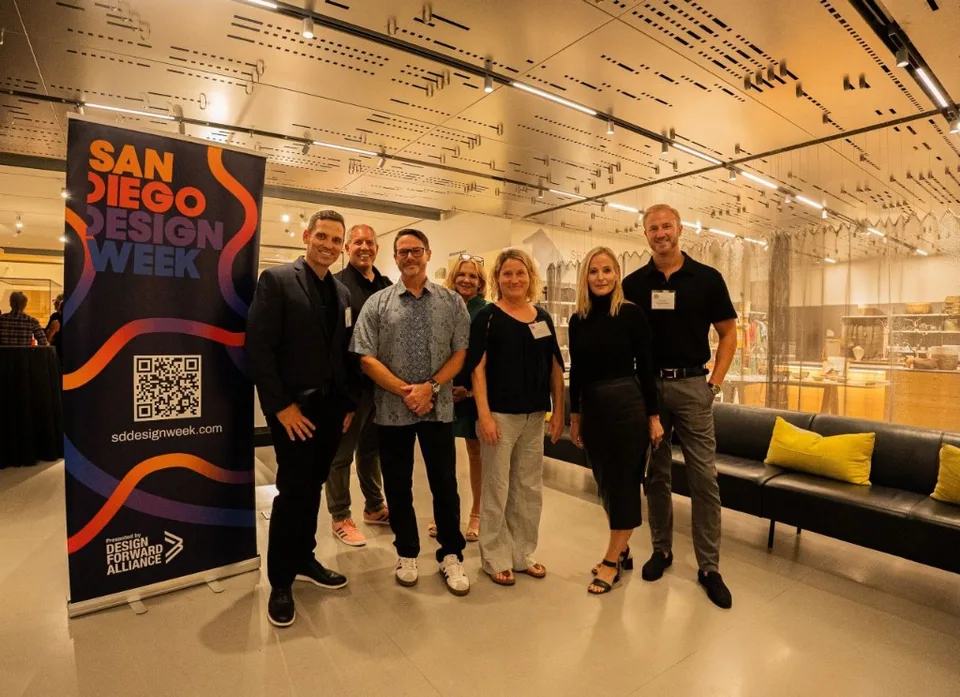Festival team beside the SDDW event banner