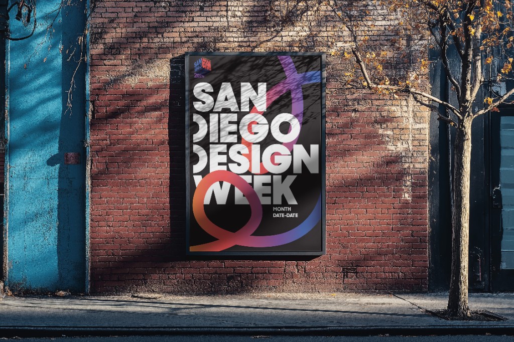 San Diego Design Week poster installed on a brick wall